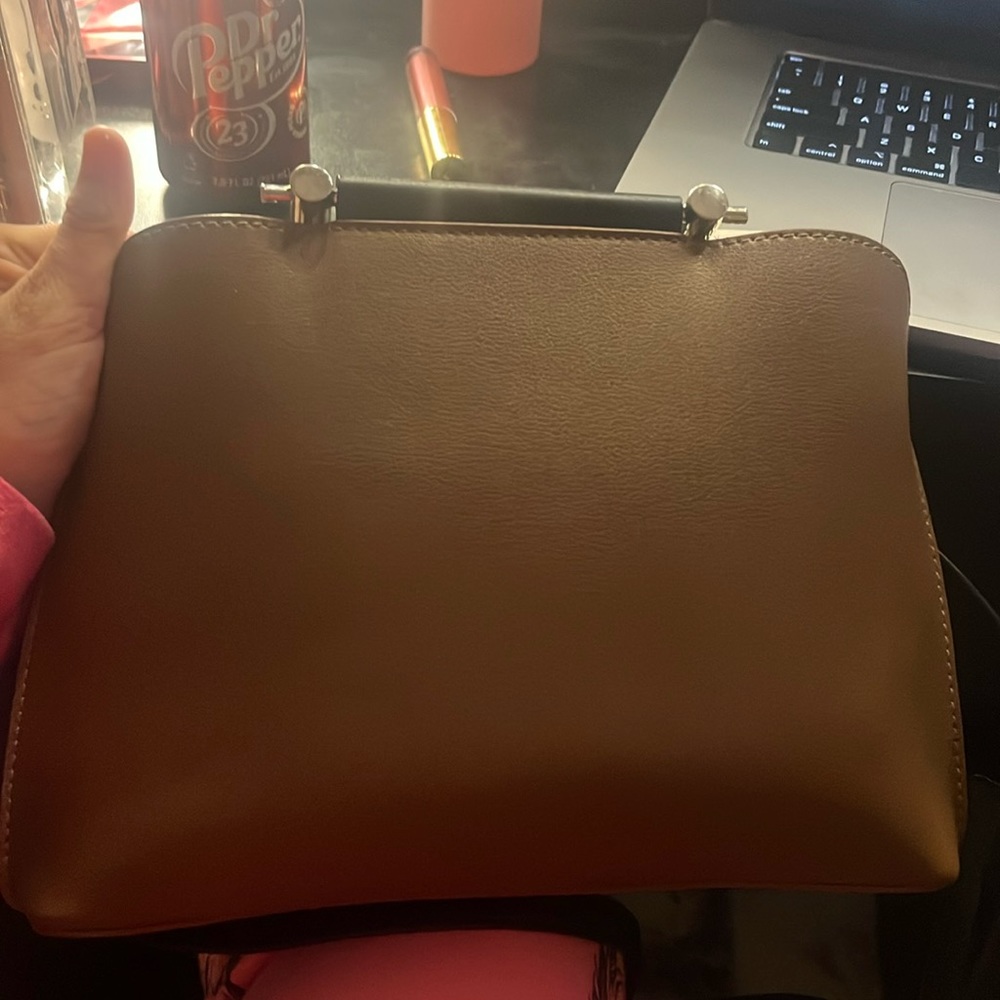 This is a Bolvaint the Patrice tote. It’s a small tote bag which has 3 pockets